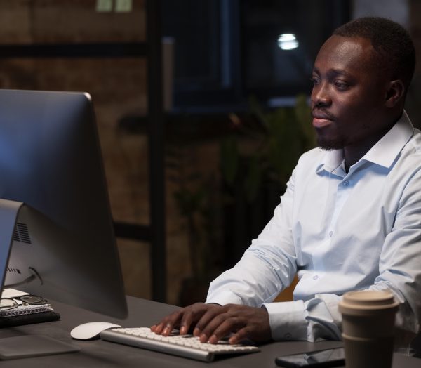 black-man-using-computer-min